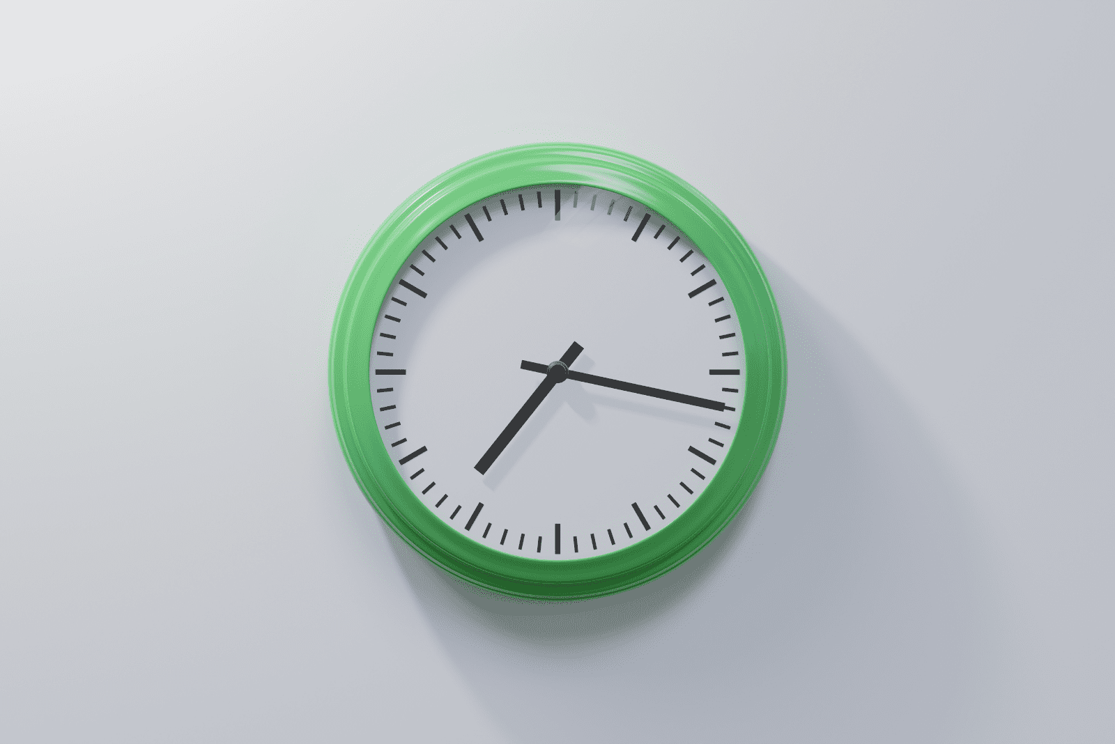 horloge verte sur un mur blanc 