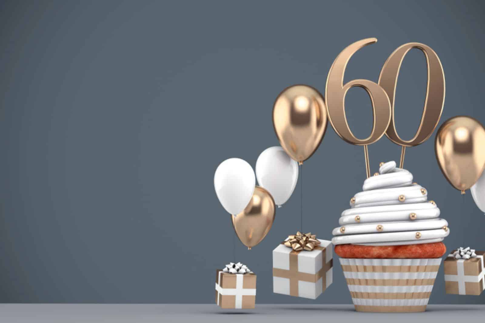 Cupcake d'anniversaire en or numéro 60 avec des ballons et des cadeaux